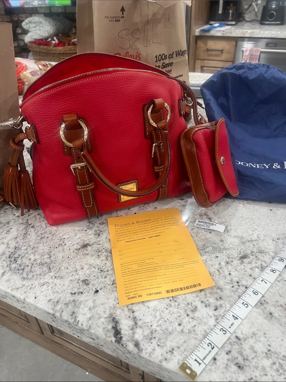 Dooney & Bourke Red Pebble Leather Satchel with Brown Trim and Tassel